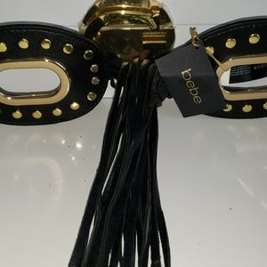 Bebe large belt with tussles.